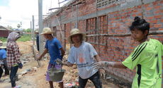 Students helping on construction works